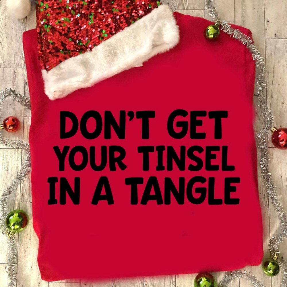 Custom made holiday tees with punny phrases, get it?